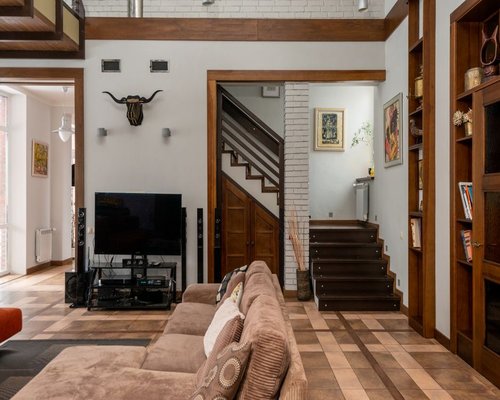 Stairs inside a modern apartment building with warm wooden accents